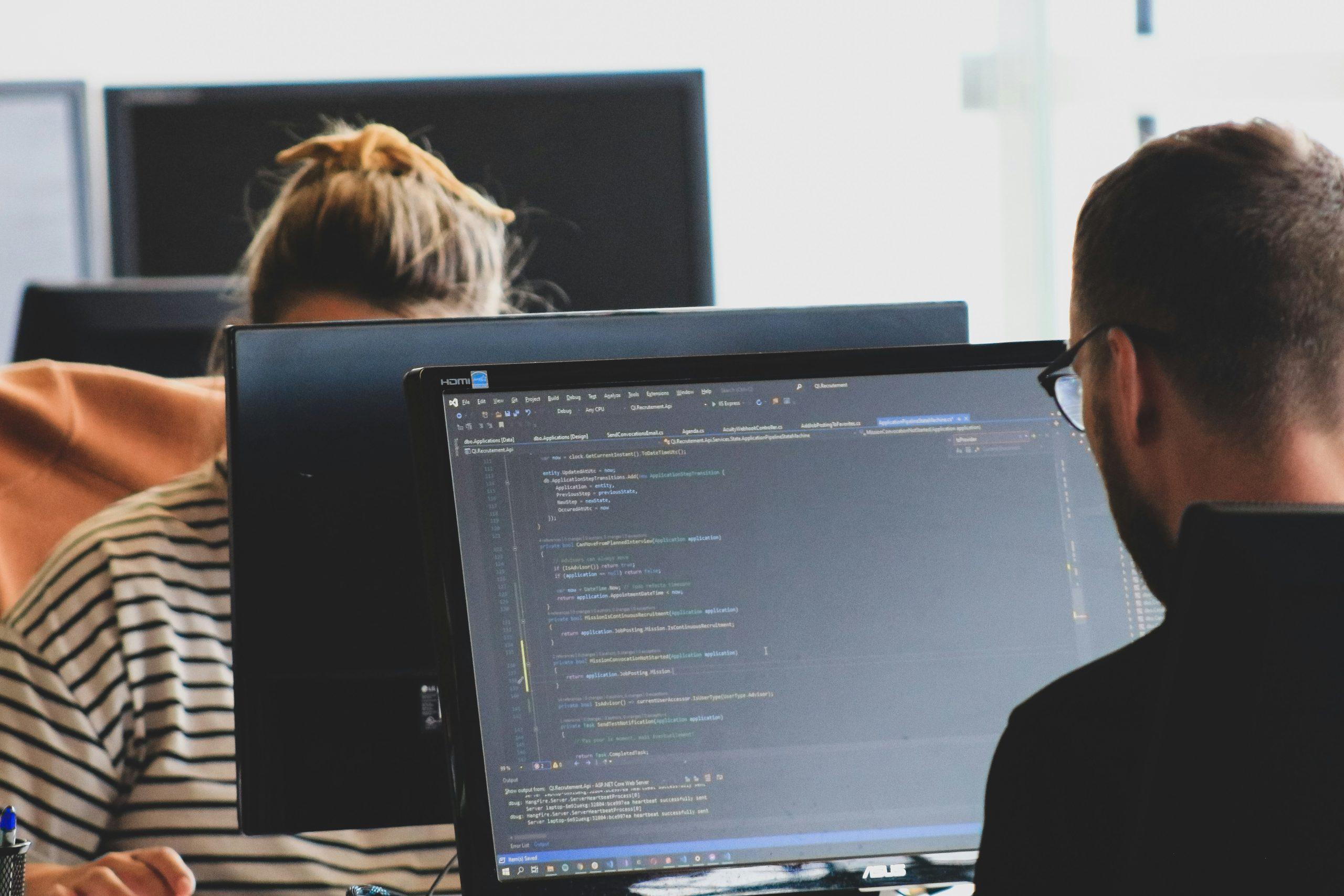 Security operations team monitoring threat activity across screens
