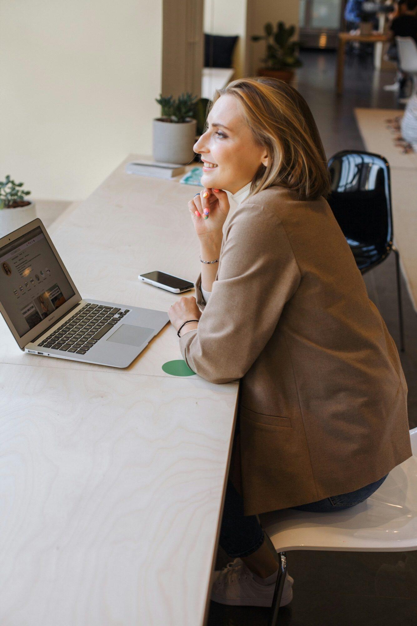 Modern office workspace with team collaborating