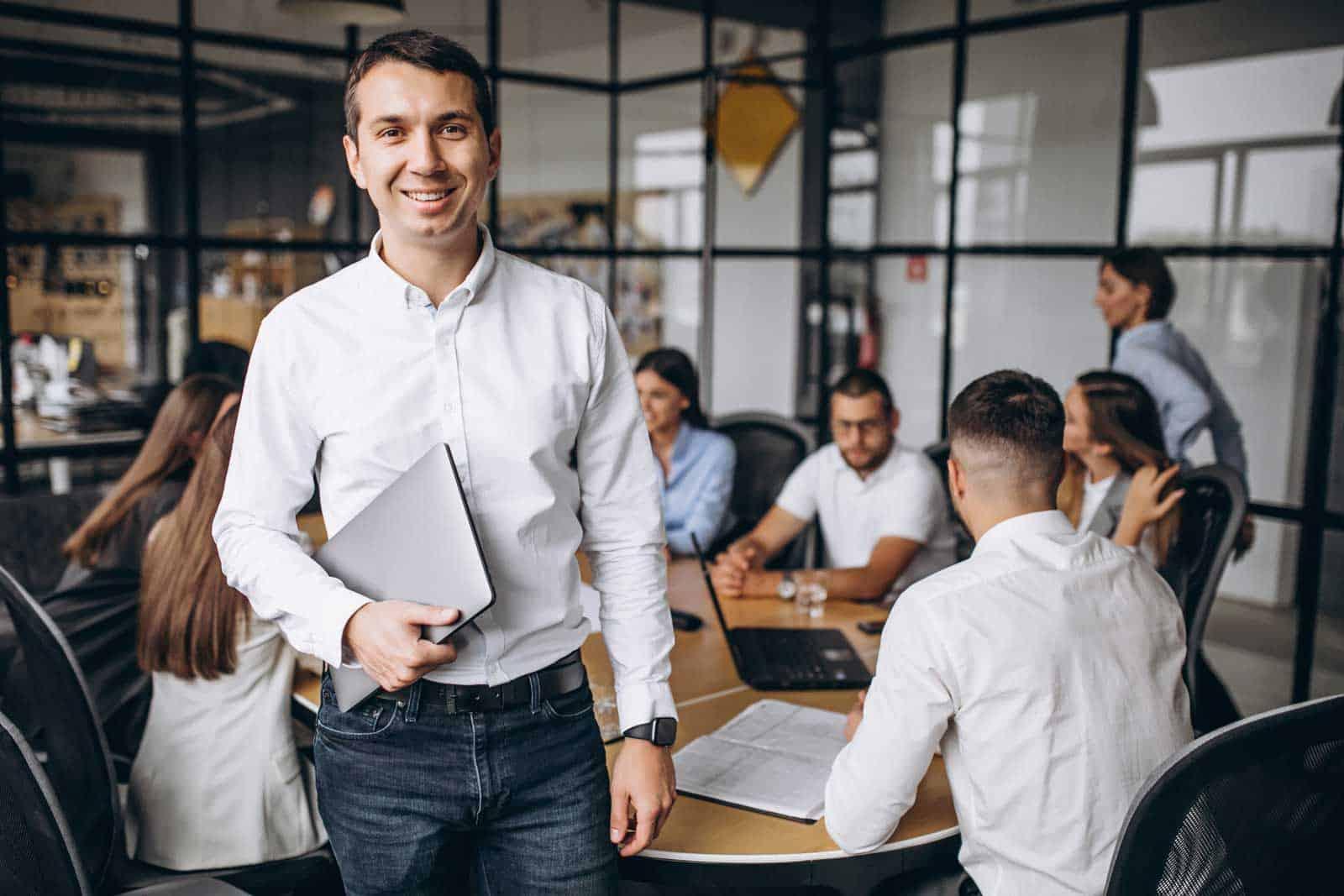Confident leader with team in a strategy session